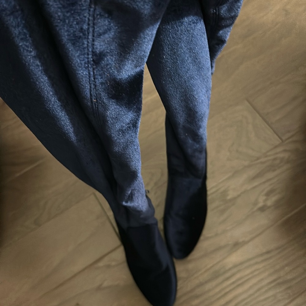 Over -the-knee boot is sleek and sexy!l Navy Velvet boots